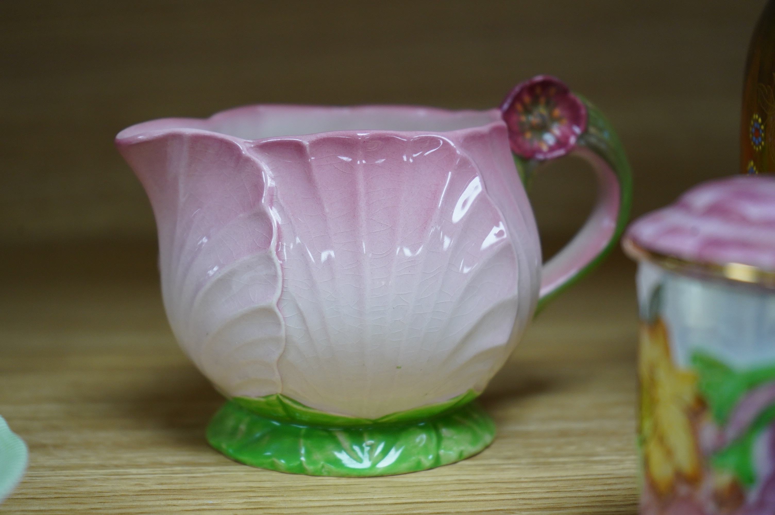 A Maling pink peony honey pot, a Carltonware lustre ‘cockerels’ vase, a similar jug, a Grays pottery dish and a Macallan whisky jug, tallest 14cm. Condition - good